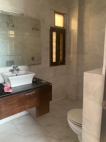 Bathroom in 3 BHK Builder Floor at Ansal Sushant Lok I, Sector 43 – for Rent
