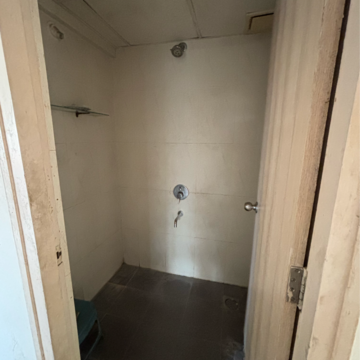 Bathroom in 1 BHK Apartment at Lodha Casario Rilletta, Khidkali – for Rent