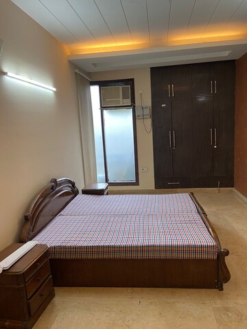 Bedroom in 3 BHK Builder Floor at Ansal Sushant Lok I, Sector 43 – for Rent