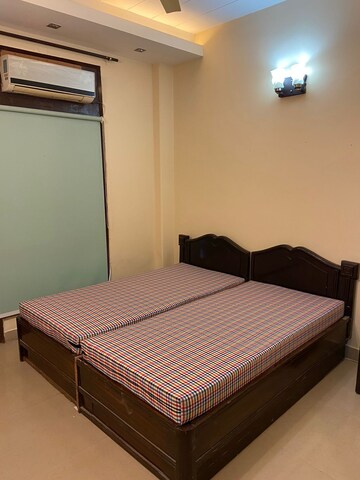 Bedroom in 3 BHK Builder Floor at Ansal Sushant Lok I, Sector 43 – for Rent