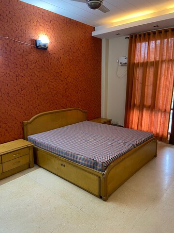 Bedroom in 3 BHK Builder Floor at Ansal Sushant Lok I, Sector 43 – for Rent