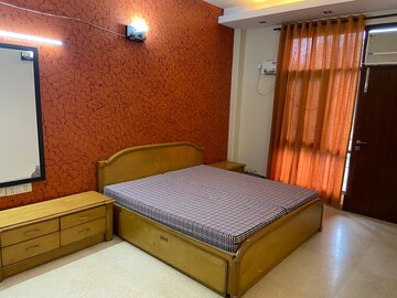 Bedroom in 3 BHK Builder Floor at Ansal Sushant Lok I, Sector 43 – for Rent