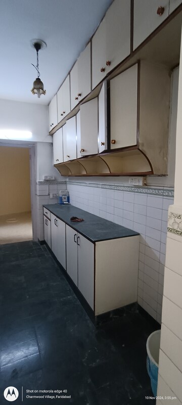 Kitchen in 2 BHK Apartment at Eros Southend Apartments, Charmwood Village – for Rent