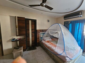 Bedroom in 3 BHK Apartment at NRI Complex Phase 2, Seawoods – for Sale