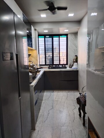 Kitchen in 2 BHK Apartment at Madhav Palacia, Ghodbunder Road – for Rent