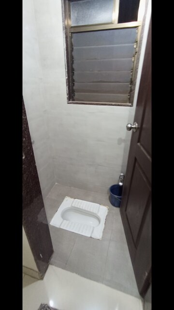 Bathroom in 1 BHK Apartment at Gopal Krishna Paradise, Kalyan East – for Rent