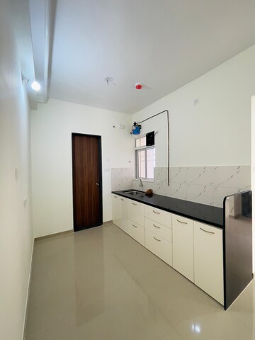 Kitchen in 2 BHK Apartment at Kolte Patil Life Republic, Hinjewadi – for Rent