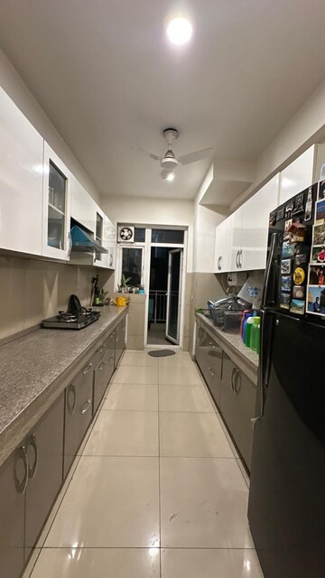 Kitchen in 3 BHK Apartment at Emaar Palm Gardens, Sector 83 – for Rent