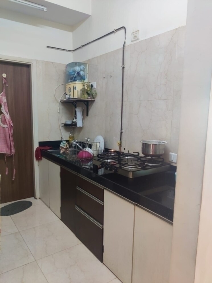 Kitchen, lnt-realty-crescent-bay 2 Bedroom 650 Sq.Ft. Apartment In Parel Mumbai 8028891