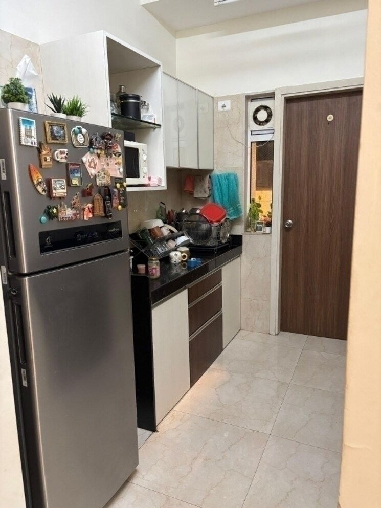 Kitchen, lnt-realty-crescent-bay 2 Bedroom 670 Sq.Ft. Apartment In Parel Mumbai 8028930