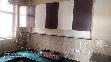 Kitchen in 2 BHK Apartment at Ansal API Santushti Enclave, Sushant Golf City – for Rent
