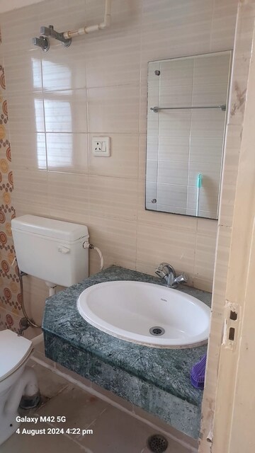 Bathroom in 2 BHK Apartment at Ansal API Santushti Enclave, Sushant Golf City – for Rent