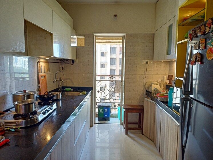 Kitchen, rosa-oasis 2 Bedroom 1015 Sq.Ft. Apartment In Ghodbunder Road Thane 8029170