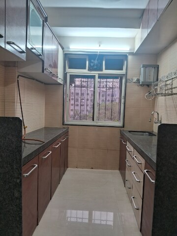 Kitchen in 2 BHK Apartment at Dosti Acres Aster, Wadala East – for Rent