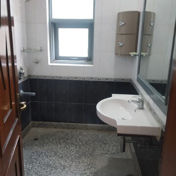 Bathroom in 3 BHK Apartment at Defence Colony – for Sale
