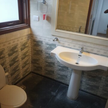 Bathroom in 3 BHK Apartment at Defence Colony – for Sale
