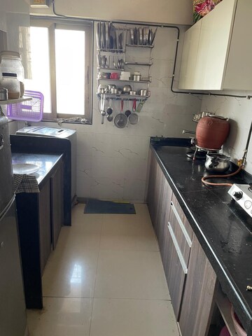 Kitchen in 2.5 BHK Apartment at Lashkaria Anurag CHS, Andheri West – for Sale