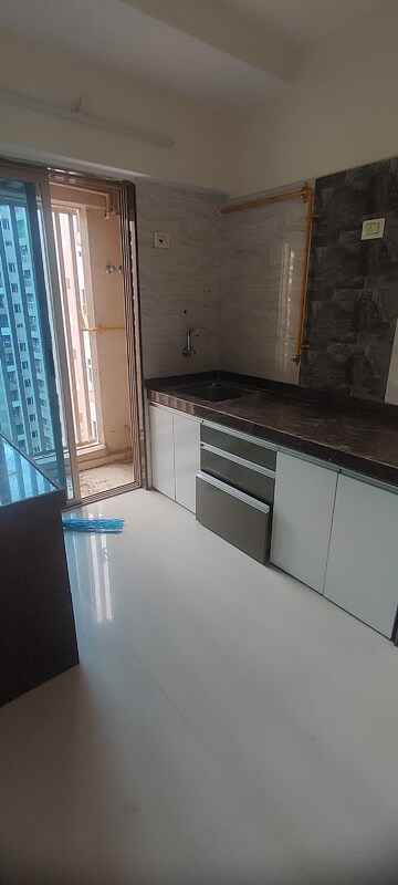 Kitchen in 2 BHK Apartment at Bhoomi Acropolis, Virar West – for Rent