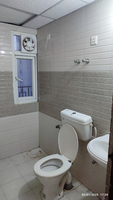 Bathroom in 2 BHK Apartment at Signature Global Orchard Avenue, Sector 93 – for Sale