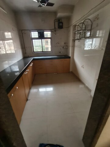Kitchen in 2 BHK Apartment at Sheth Vasant Lawns, Laxmi Nagar – for Rent