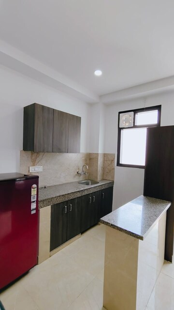 Kitchen in 1 RK Builder Floor at Ansal Sushant Lok I, Sector 43 – for Rent