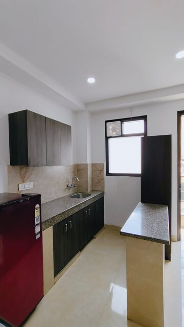 Kitchen in 1 RK Builder Floor at Ansal Sushant Lok I, Sector 43 – for Rent