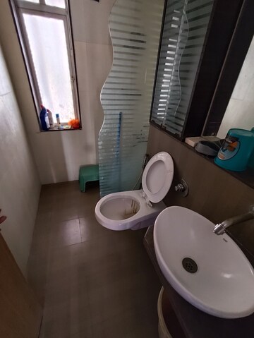 Bathroom in 2 BHK Apartment at DB Parkwoods, Ghodbunder Road – for Rent