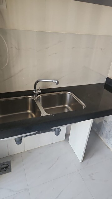 Kitchen in 1.5 BHK Apartment at Chandiwala Pearl Heaven, Andheri East – for Rent