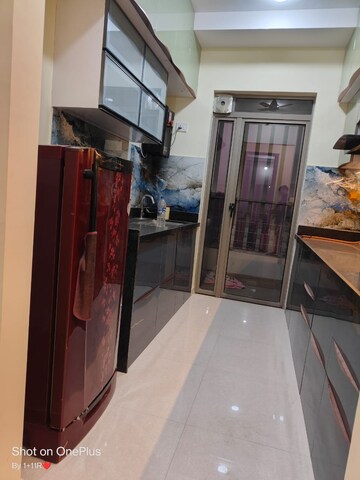 Kitchen in 2 BHK Apartment at Kalpataru Paramount, Kapur Bawdi – for Rent
