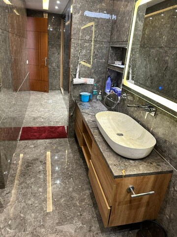 Bathroom in 4 BHK Builder Floor at DLF Atria, Dlf Phase ii – for Rent
