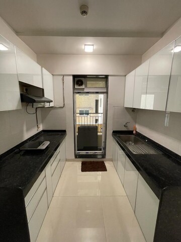 Kitchen in 2 BHK Apartment at Ashar Axis, Majiwada – for Rent