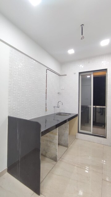 Kitchen in 2 BHK Apartment at JVM Corner Stone, Naupada – for Rent