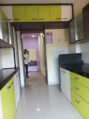 Kitchen in 2 BHK Apartment at Soham Garden, Manpada – for Rent