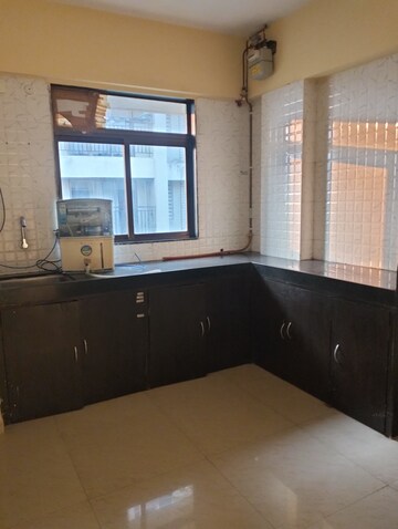 Kitchen in 1 BHK Apartment at K M Horizon Palms III, Owale – for Sale