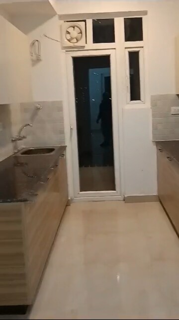 Kitchen in 3.5 BHK Apartment at ATS Homekraft Pious Hideaways, Sector 150 – for Rent