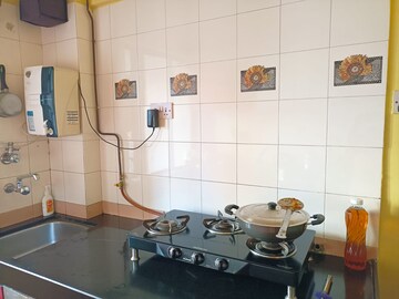 Kitchen in 2 BHK Apartment at Divya Stuti CHS, Goregaon East – for Sale