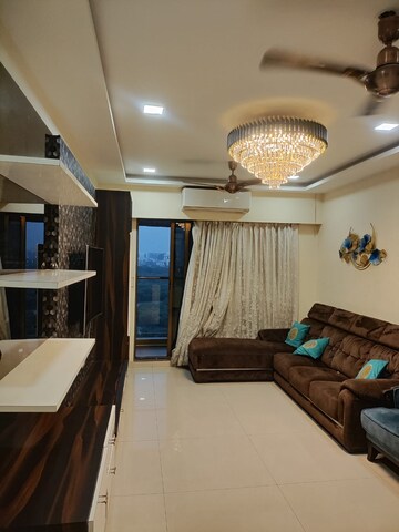 Living Room in 2 BHK Apartment at Juhi Greens, Seawoods – for Rent