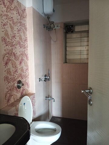 Bathroom in 2 BHK Apartment at Soham Garden, Manpada – for Rent