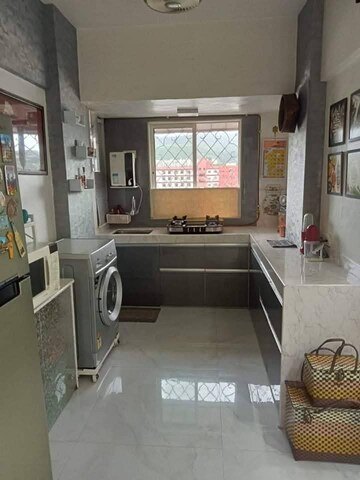 Kitchen in 1 BHK Apartment at Satellite Garden, Goregaon East – for Rent