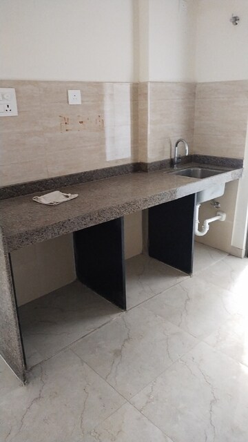 Kitchen in 3 BHK Apartment at Sunteck Maxxworld, Naigaon East – for Rent