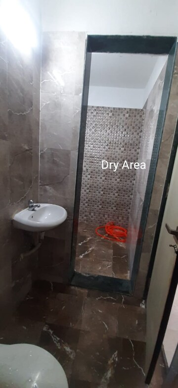 Bathroom in 2 BHK Apartment at Mohan Willows, Badlapur East – for Rent