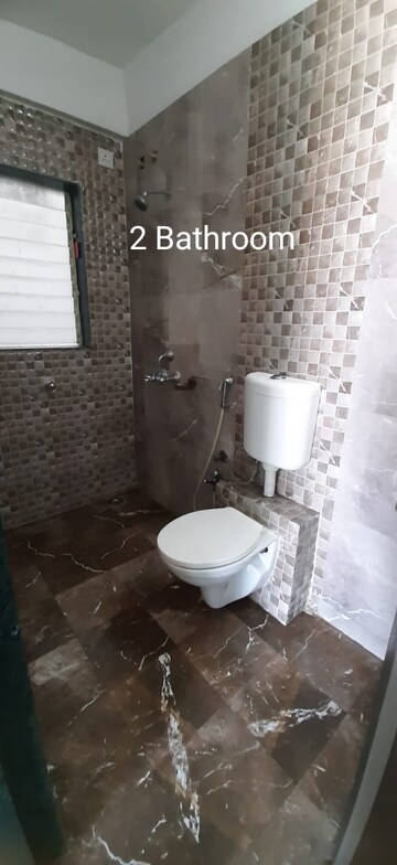 Bathroom in 2 BHK Apartment at Mohan Willows, Badlapur East – for Rent