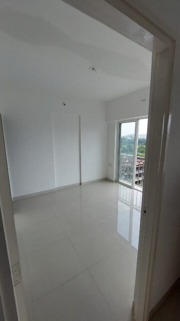 Room in 2 BHK Apartment at Godrej Vihaa, Badlapur East – for Sale