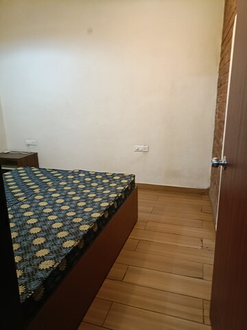 Bedroom in 2 BHK Builder Floor at Ansal Plaza Sector-23, Sector 23 – for Rent