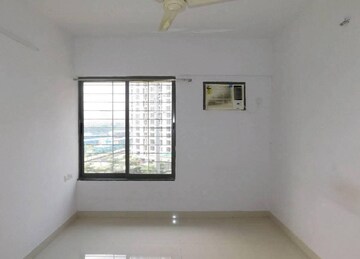 Living Room in 1 BHK Apartment at Lodha Crown Quality Homes, Majiwada – for Rent