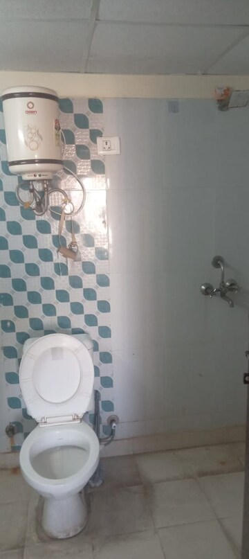 Bathroom in 2 BHK Apartment at Aims Golf City, Sector 75 – for Rent