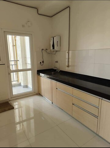 Kitchen in 2 BHK Apartment at Godrej Infinity, Keshav Nagar – for Rent