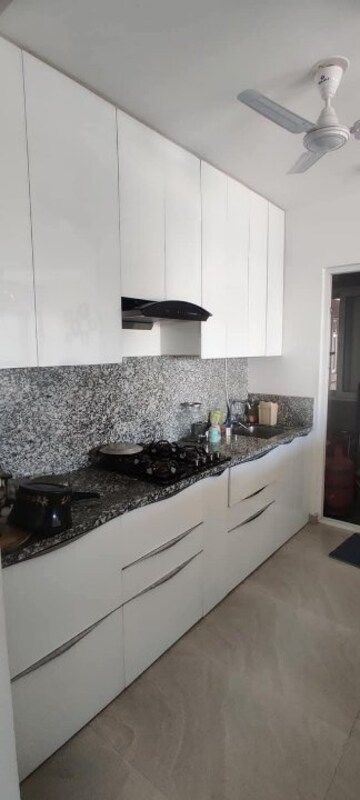 Kitchen in 2 BHK Apartment at Oxford Florida Water Color, Mundhwa – for Rent