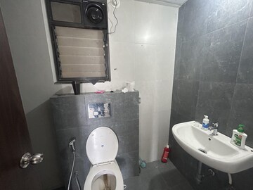 Bathroom in 2 BHK Apartment at Shapoorji Pallonji Joyville Hinjewadi, Hinjewadi – for Rent