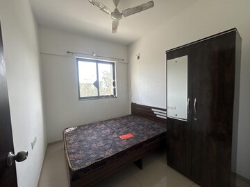 Bedroom in 2 BHK Apartment at Shapoorji Pallonji Joyville Hinjewadi, Hinjewadi – for Rent